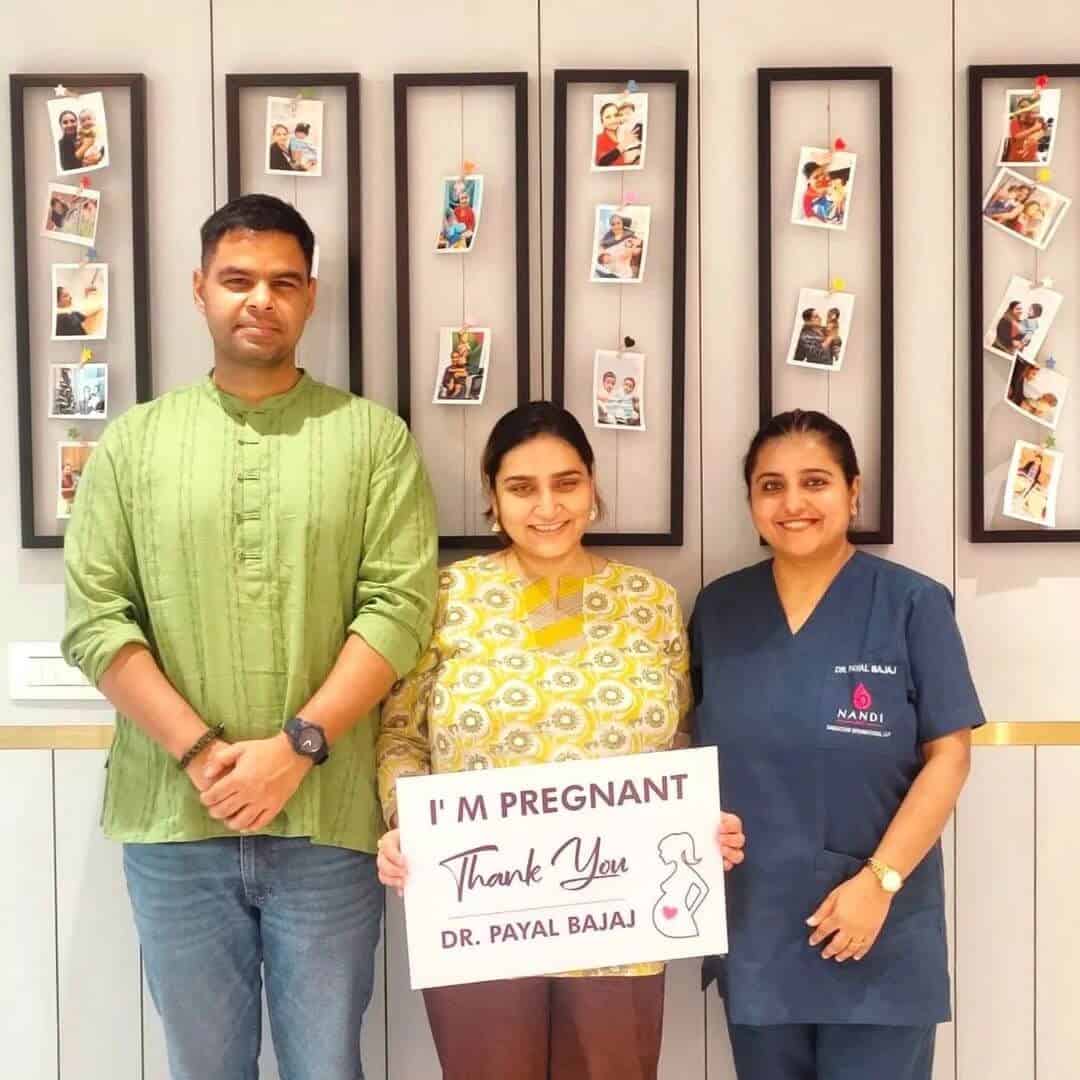 Happy family with newborn miracle baby conceived through IVF at Nandi IVF - Photo 3