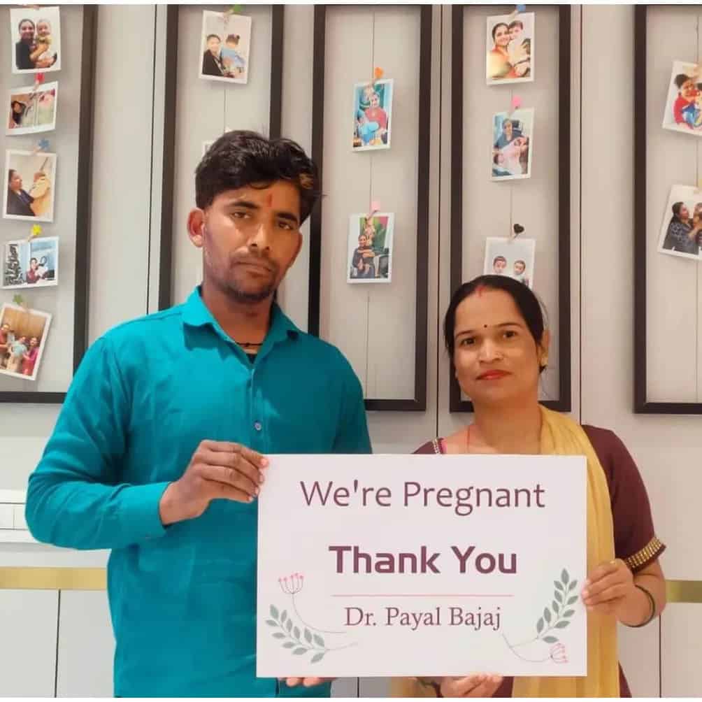 Happy family with newborn miracle baby conceived through IVF at Nandi IVF - Photo 6